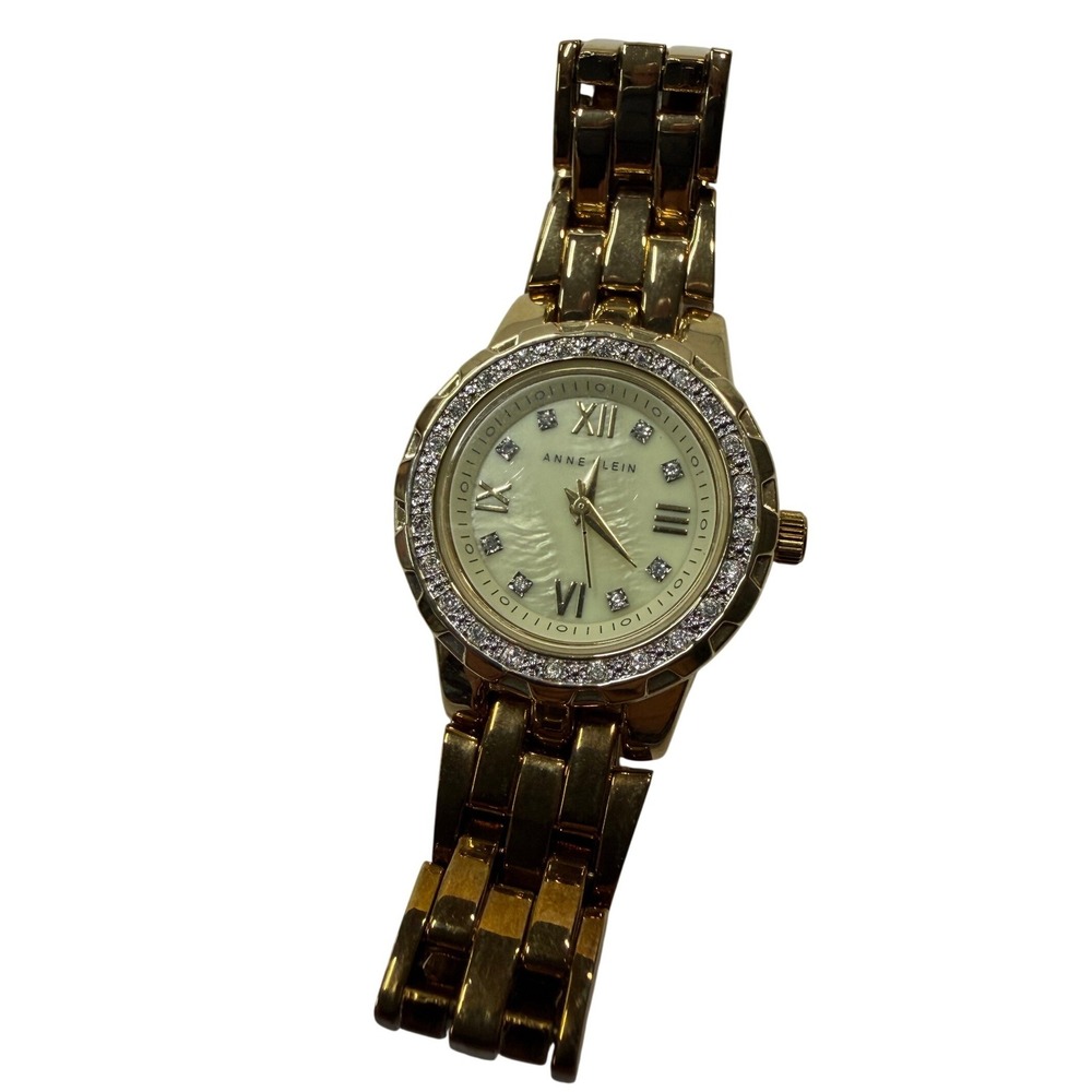 Anne Klein Womens Gold Tone Crystal Bezel Mother of Pearl Watch